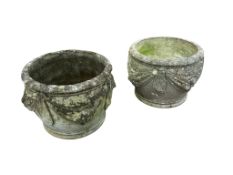 A pair of circular reconstituted stone garden planters, diameter 40cm, height 32cm