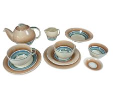 A Susie Cooper part tea service to include a teapot, milk jug and sugar bowl, teapot 18cm wide