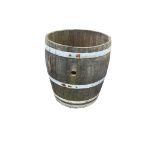 A French three quarter cut wine barrel, diameter 64cm, height 70cm