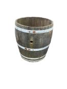 A French three quarter cut wine barrel, diameter 64cm, height 70cm