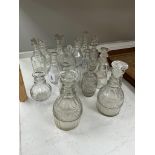 Six pairs of 19th century glass decanters, including a Regency example, together with five