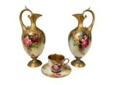 A pair of Worcester ewers, RN411028, together with a coffee cup & saucer, each painted with roses,