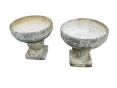 A pair of Grandon circular reconstituted stone garden planters, diameter 60cm, height 58cm