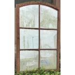 A Polish cast iron factory window centre pivot mirror, width 113cm, height 182cm