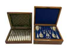 A cased silver plated dessert set and a cased mother of pearl handled dessert set, largest 34cm