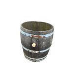 A French three quarter cut wine barrel, diameter 64cm, height 70cm