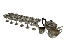 A set of 12 Mappin & Webb EPNS champagne coupes, together with an EPNS three-piece tea set,