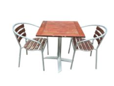 A slatted teak and aluminium square garden table, 70cm, height 74cm together with two matching