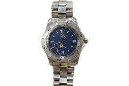 A recent stainless steel Tag Heuer Professional quartz wrist watch, the blue dial with baton
