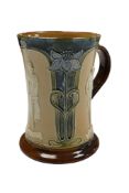 Cycling interest, A Royal Doulton Lambeth Stoneware tankard, circa 1900, the waisted body with three