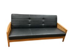 A mid century caned oak sofa bed, width 194cm, depth 73cm, height 76cm
