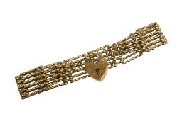 A late 20th century 9ct gold gate link bracelet, with heart shaped padlock clasp, approx. 16cm, 15.7