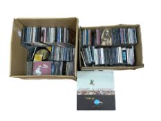 A large collection of music CDs, contained within two boxes, including a wide selection of classic