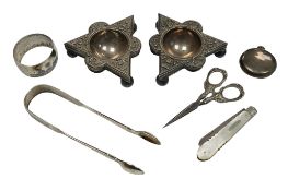 A pair of Victorian silver fiddle pattern sugar tongs, London, 1848, together with a small silver