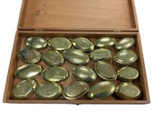 A collection of 20 early 20th century brass snuff boxes to include examples dated 1906, 1908 & 1911