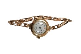 A lady’s early to mid 20th century 9ct manual wind wrist watch, with Arabic dial, on a 9ct
