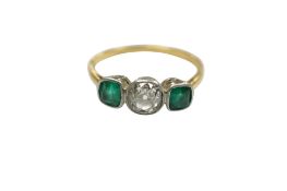 An 18ct and plat, single stone diamond and two stone emerald set ring, size N/O, gross weight 1.9