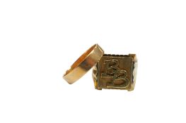 An unmarked yellow metal signet ring, initialled BB, together with a Middle Eastern yellow metal