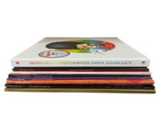 Seven Grateful Dead LP record albums and a Europe ‘72 box set, the albums all recent pressings,