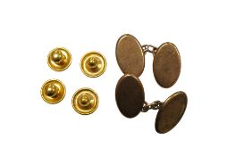 A pair of 9ct gold oval cufflinks and four 9ct dress studs, 11.8 grams.