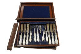 A Victorian cased set of twelve pairs of mother of pearl handled silver dessert eaters, by Martin,