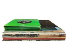 Eight Rolling Stones LP record albums, including; Between the Buttons, Sticky Fingers, Exile on Main