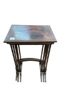 An Edwardian fiddleback mahogany nest of three occasional tables, width 45cm, depth 32cm, height