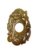 A Chinese russet jade carved pendant, 7.5cm wide