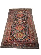 An antique Malayer blue ground rug, 194 x 110cm