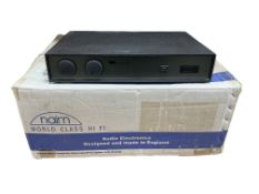 A boxed Naim NA AVD1 surround sound processor, serial number 118429