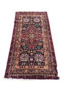 An Afghan blue ground Kazak rug, 178 x 90cm