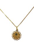 An Italian 750 octagonal pendant decorated with the national emblem of Saudi Arabia, 17mm, on a