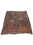An antique Caucasian blue ground rug, 144 x 126cm