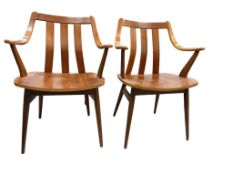 A pair of Dutch teak and plywood armchairs designed by Cees Braakman for Pastoe, width 60cm, depth