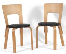 Alvar Aalto (Finnish, 1898-1976) for Artek: A pair of 'Model 66' chairs