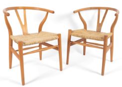 Hans Wegner (Danish, 1914-2007) for Carl Hansen & Søn: A pair of 'Model CH24' wishbone chairs