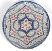 Louise Powell (1882-1956) for Wedgwood: A foliate decorated charger
