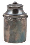 An Edwardian Arts & Crafts silver tea caddy and cover, of cylindrical form, with stylised decoration