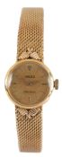A lady's 9ct gold Rolex Precision manual wind wrist watch, on an integral 9ct gold bracelet, maker