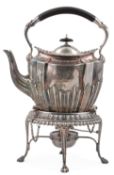An Edwardian demi fluted silver tea kettle on stand, with burner by James Dixon & Sons, of oval