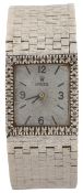 A lady’s white metal and diamond set manual wind dress wrist watch, the square dial bearing the word