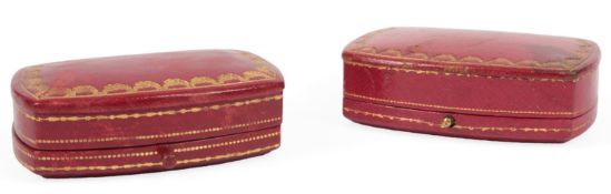 Cartier Paris, two cufflink cases, early-mid 20th century, each in red leather with gilt tooling,