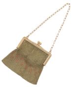 A 9ct gold purse, circa 1927, the gold bag of mesh linking with a chain handle, lined with