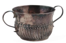 A Queen Anne Britannia standard demi-fluted silver miniature porringer, maker possibly John Cory,