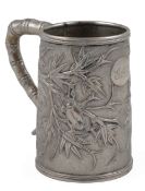 A late 19th century Chinese Export white metal mug, by Cutshing, Canton, embossed with insects