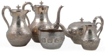 A late Victorian Anglo-Indian silver five piece tea and coffee service by Frederick Elkington, of