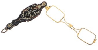 A tortoiseshell and gilt metal lorgnette, late 19th century, the tortoiseshell handle with gilt
