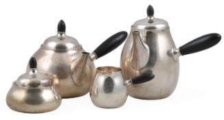 A 1930's/1940's Danish Georg Jensen sterling four piece tea set, design number 80A, of planished