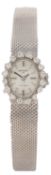 Anker, a lady's white gold and diamond wristwatch, 1960s, the oval textured dial with baton