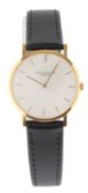 A gentleman's 18k gold Patek Philippe Calatrava manual wind wrist watch, model ref. 3512, with baton